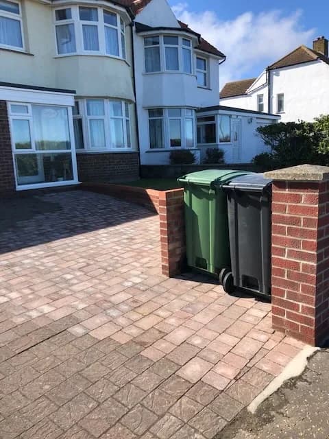 Completed block-paved front driveway and brick wall