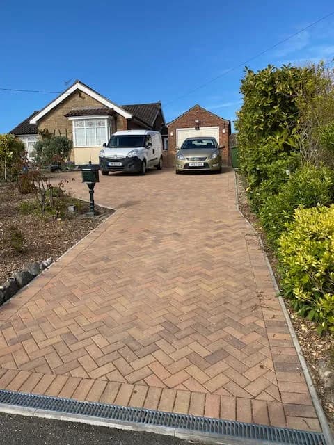 Completed herringbone block-paved driveway